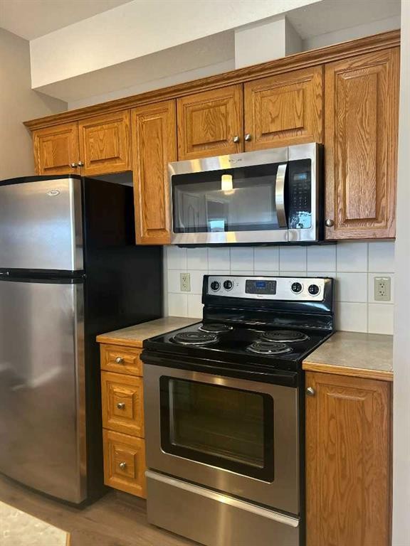 307-4403 67A Avenue, Olds, AB - Indoor Photo Showing Kitchen