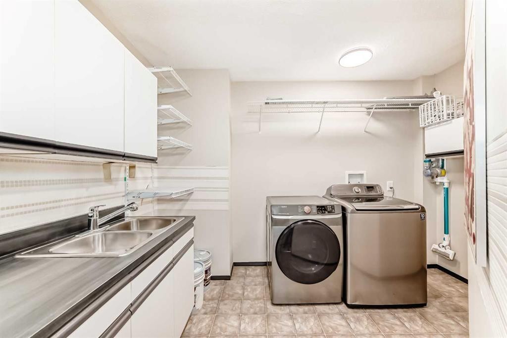 5 Chinook Crescent, Beiseker, AB - Indoor Photo Showing Laundry Room