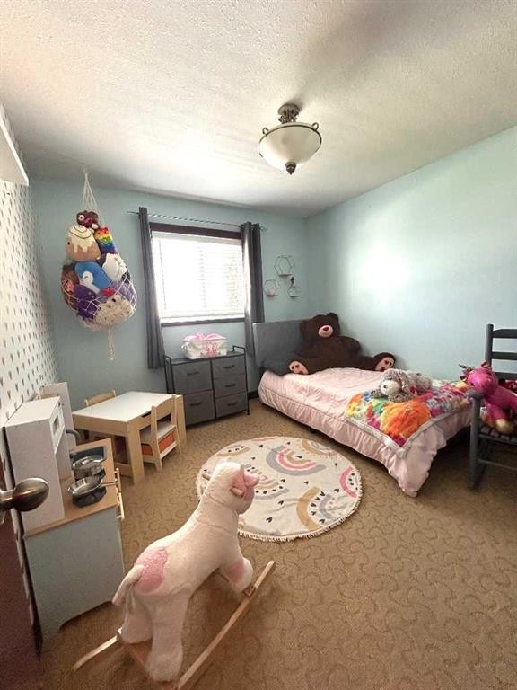 223 15 Street East, Brooks, AB - Indoor Photo Showing Bedroom