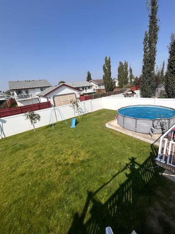 223 15 Street East, Brooks, AB - Outdoor With Backyard