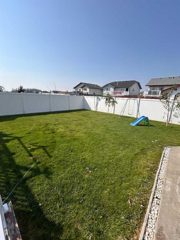 223 15 Street East, Brooks, AB - Outdoor With Backyard