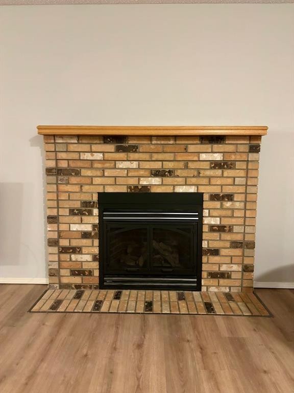32 Ramsey Close, Red Deer, AB - Indoor Photo Showing Living Room With Fireplace