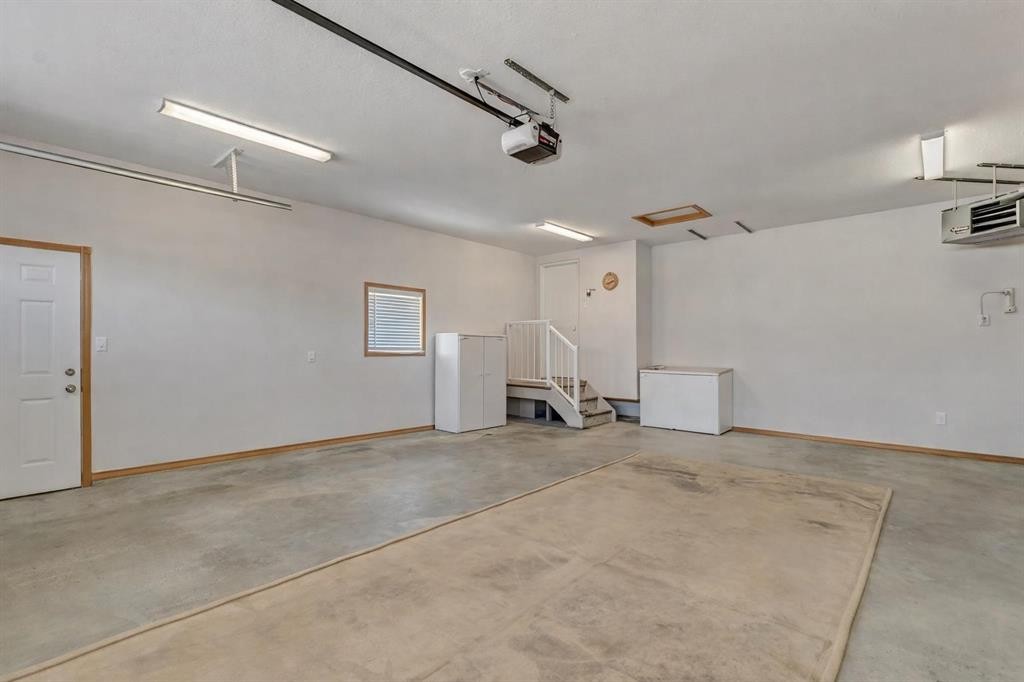 99 Greystone Close, Brooks, AB - Indoor Photo Showing Garage