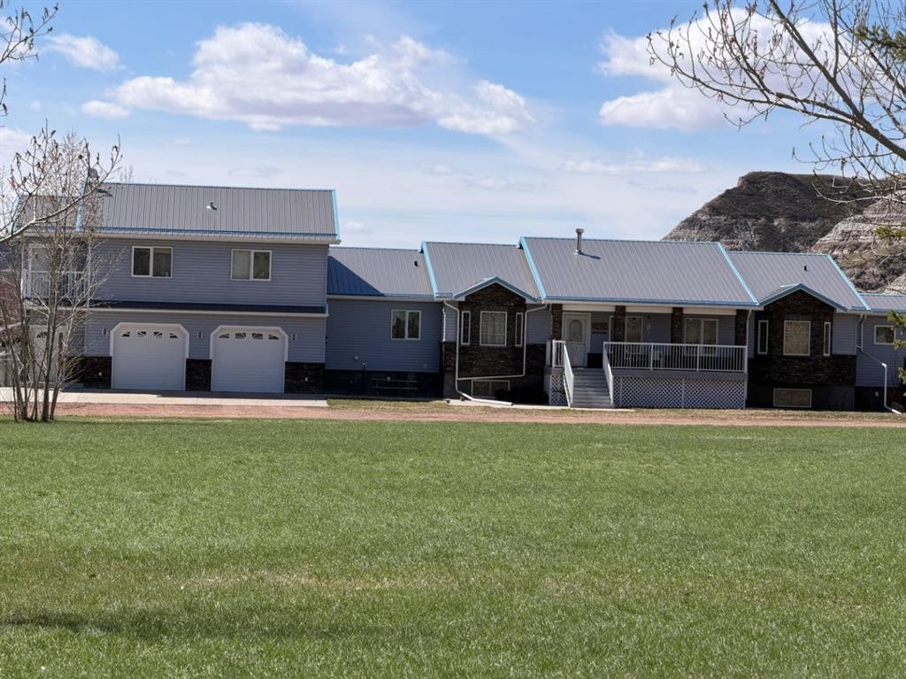 765 Excelsior Avenue, Drumheller, AB - Outdoor With Deck Patio Veranda With Facade
