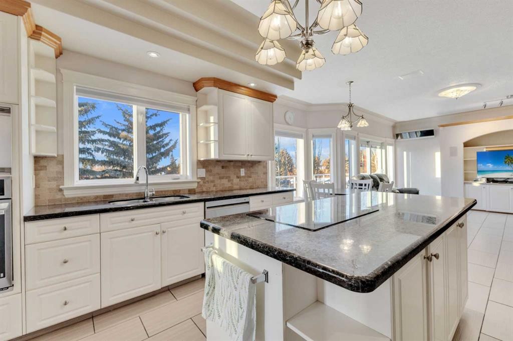 25 Ashmore Close, Red Deer, AB - Indoor Photo Showing Kitchen With Upgraded Kitchen