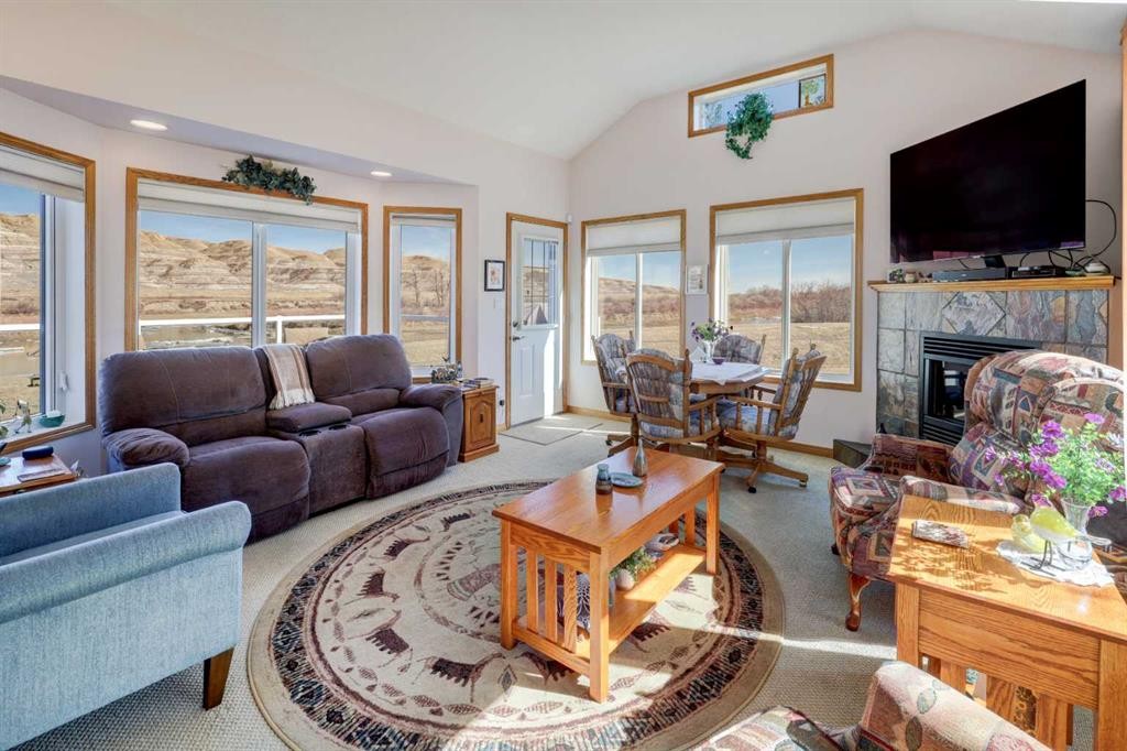 26 Willow Point, Drumheller, AB - Indoor Photo Showing Living Room With Fireplace