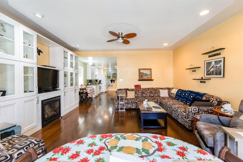 145 Centre Street, Drumheller, AB - Indoor Photo Showing Living Room With Fireplace