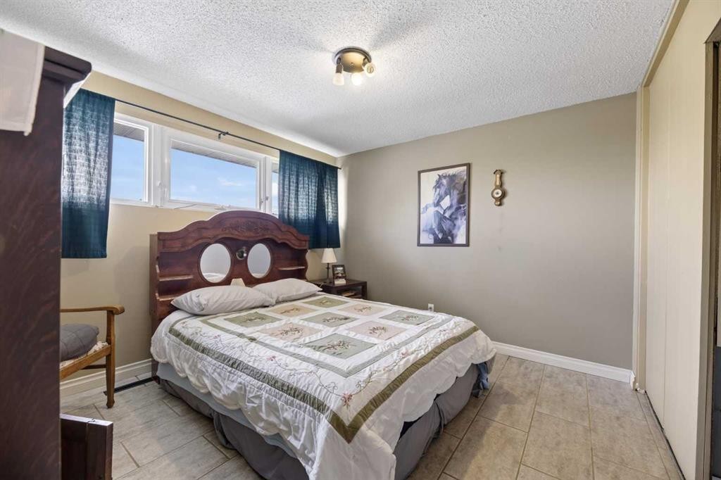 Highway 791, Rural Mountain View County, AB - Indoor Photo Showing Bedroom