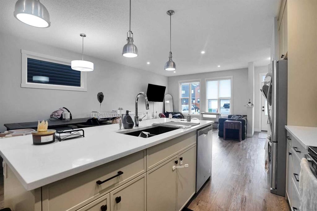 44 Seton Villas Se, Calgary, AB - Indoor Photo Showing Kitchen With Double Sink