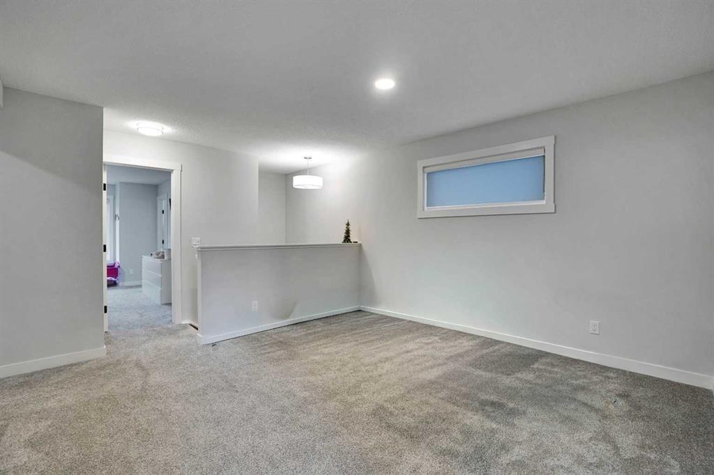 44 Seton Villas Se, Calgary, AB - Indoor Photo Showing Other Room