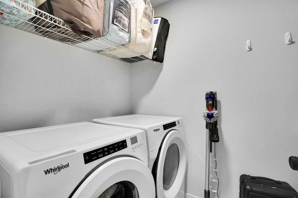 44 Seton Villas Se, Calgary, AB - Indoor Photo Showing Laundry Room