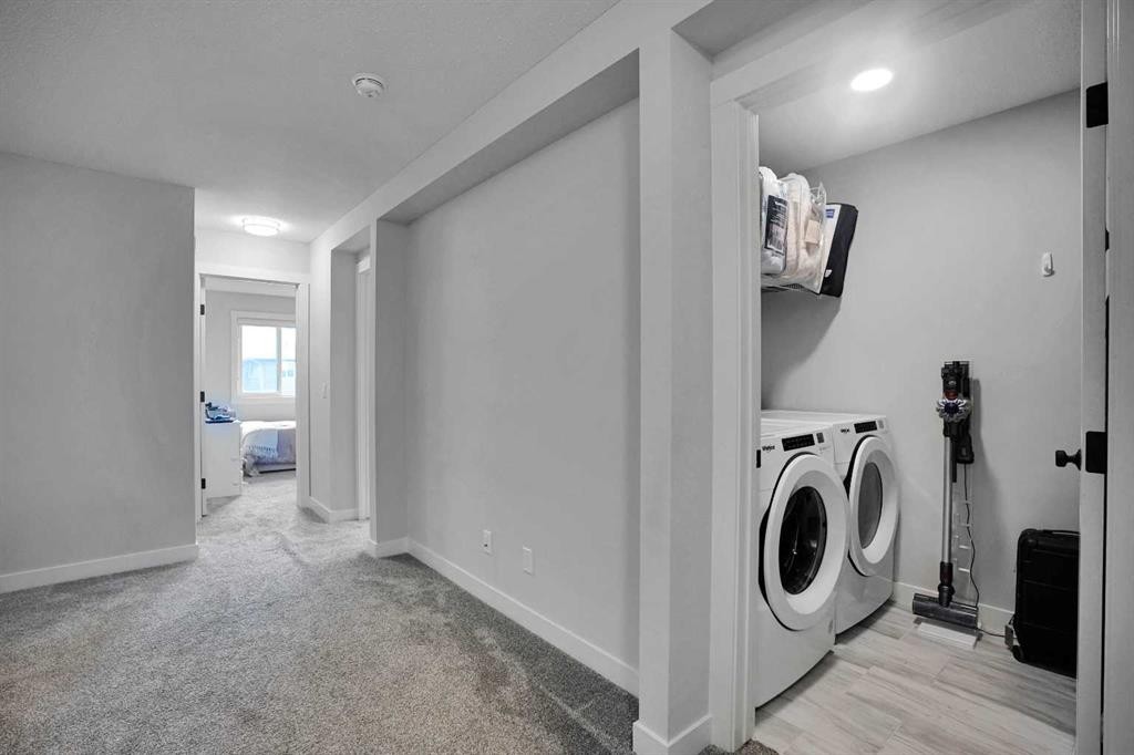 44 Seton Villas Se, Calgary, AB - Indoor Photo Showing Laundry Room