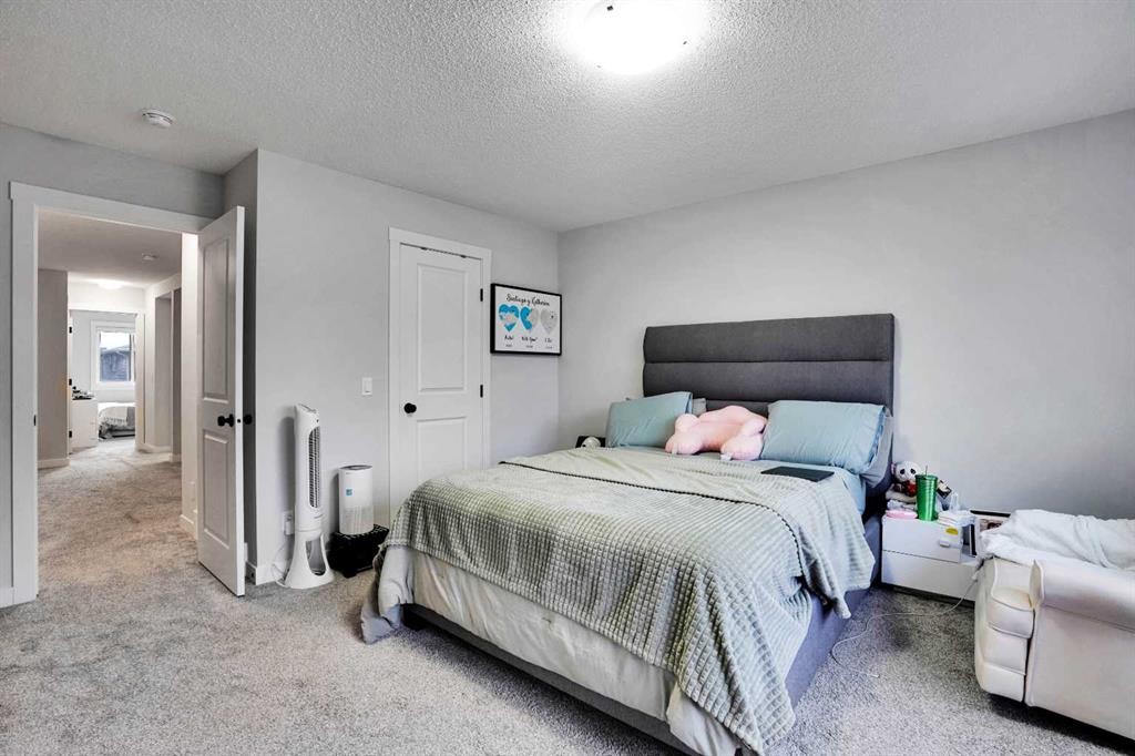 44 Seton Villas Se, Calgary, AB - Indoor Photo Showing Bedroom