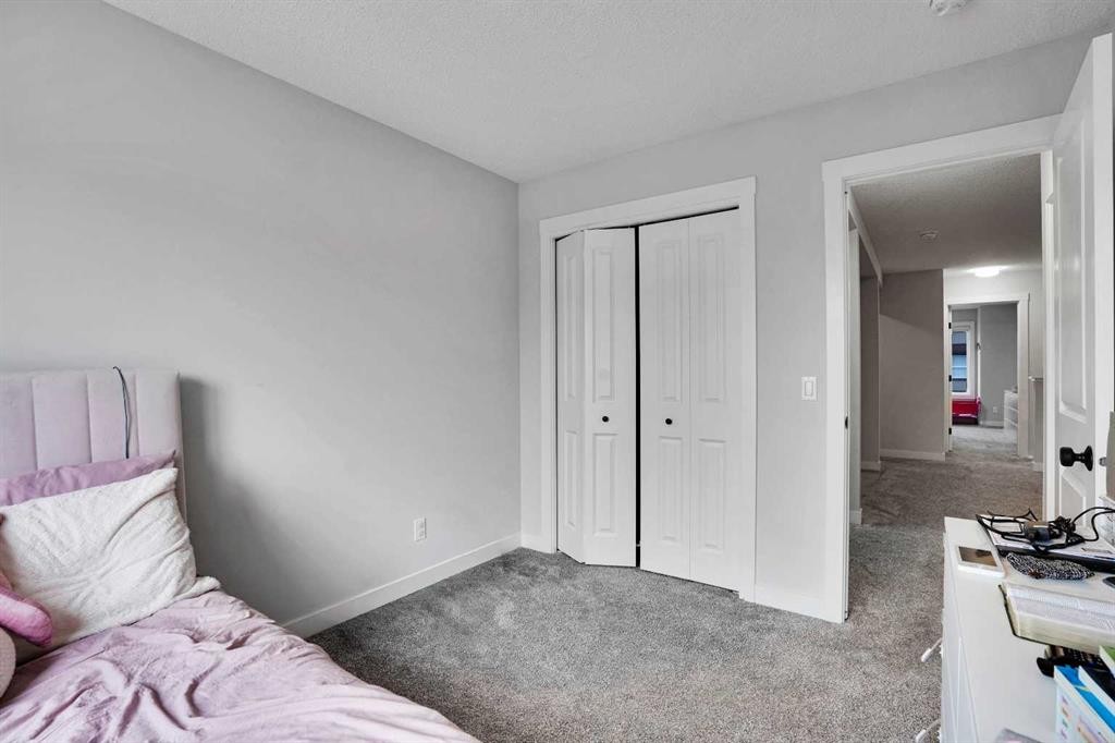 44 Seton Villas Se, Calgary, AB - Indoor Photo Showing Bedroom