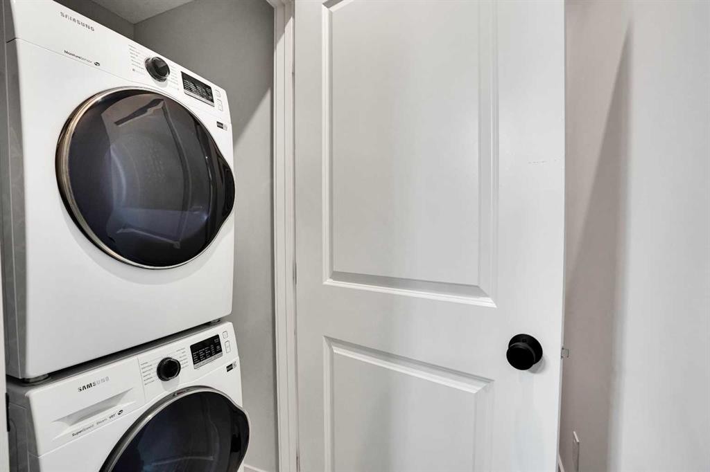 44 Seton Villas Se, Calgary, AB - Indoor Photo Showing Laundry Room