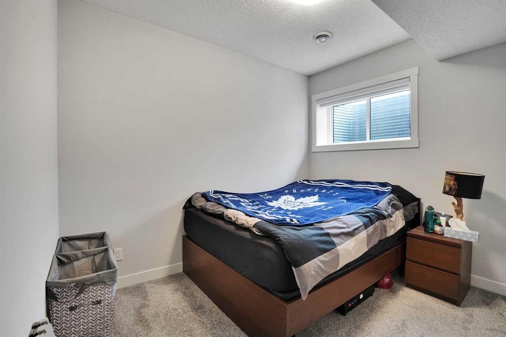 44 Seton Villas Se, Calgary, AB - Indoor Photo Showing Bedroom