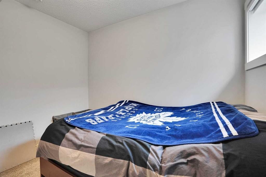 44 Seton Villas Se, Calgary, AB - Indoor Photo Showing Bedroom
