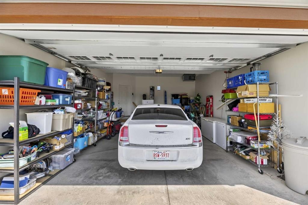 1109 Cornerstone Crescent, Olds, AB - Indoor Photo Showing Garage