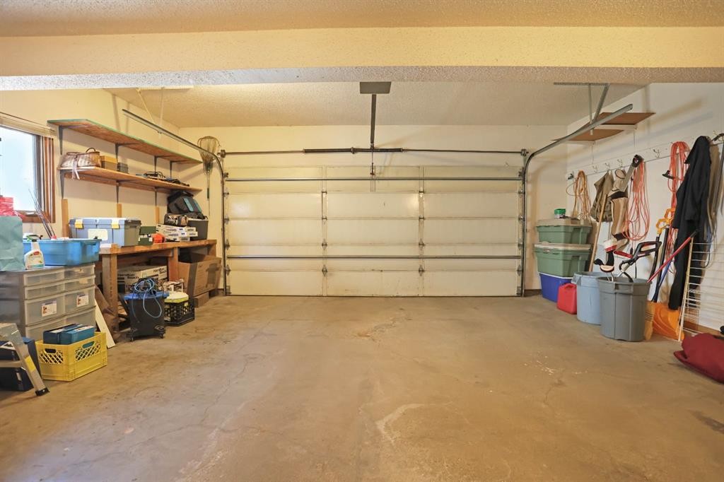 35 Parkland Close East, Brooks, AB - Indoor Photo Showing Garage