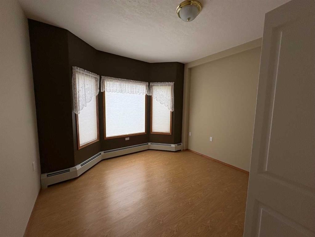 105-5600 Sunrise Crescent, Olds, AB - Indoor Photo Showing Other Room
