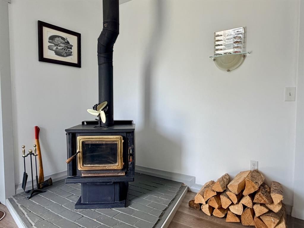 205 2 Street West, Munson, AB - Indoor With Fireplace