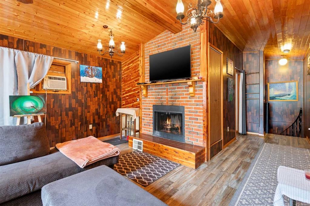 109 Makwa Lake Indian Reserve 129B, Loon Lake, SK - Indoor Photo Showing Living Room With Fireplace