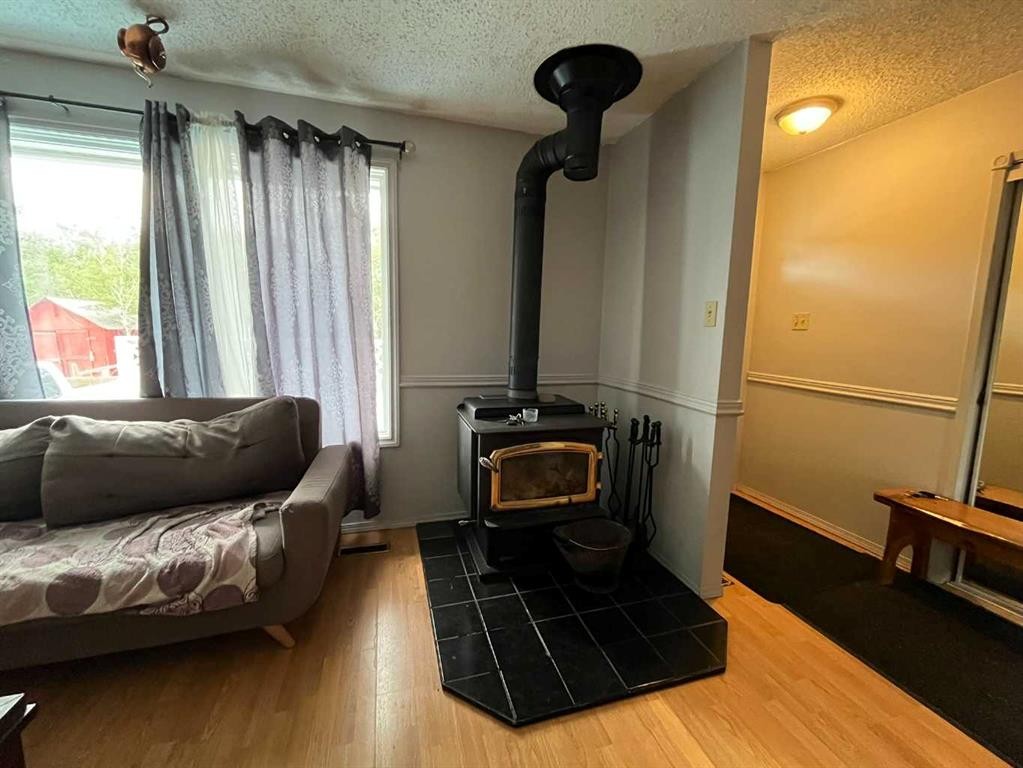 85057 90 Range, Rural Two Hills No. 21, County Of, AB - Indoor With Fireplace