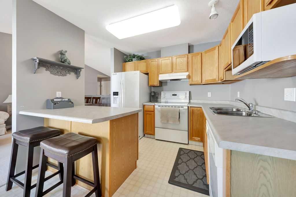 22-4201 56 Avenue, Lloydminster, AB - Indoor Photo Showing Kitchen With Double Sink