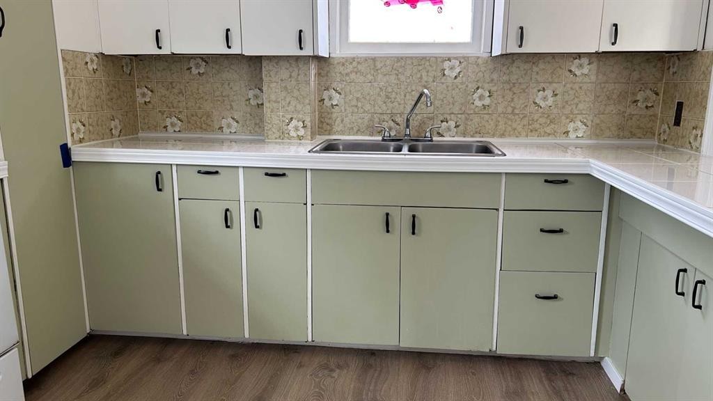 13 2 Avenue East, Marshall, SK - Indoor Photo Showing Kitchen With Double Sink