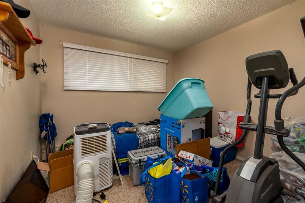 1-6-5502 49 Avenue, Lloydminster, SK - Indoor Photo Showing Gym Room