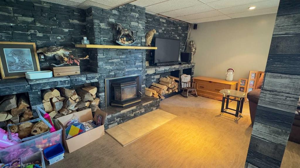 43365 Hwy 881, Hardisty, AB - Indoor With Fireplace