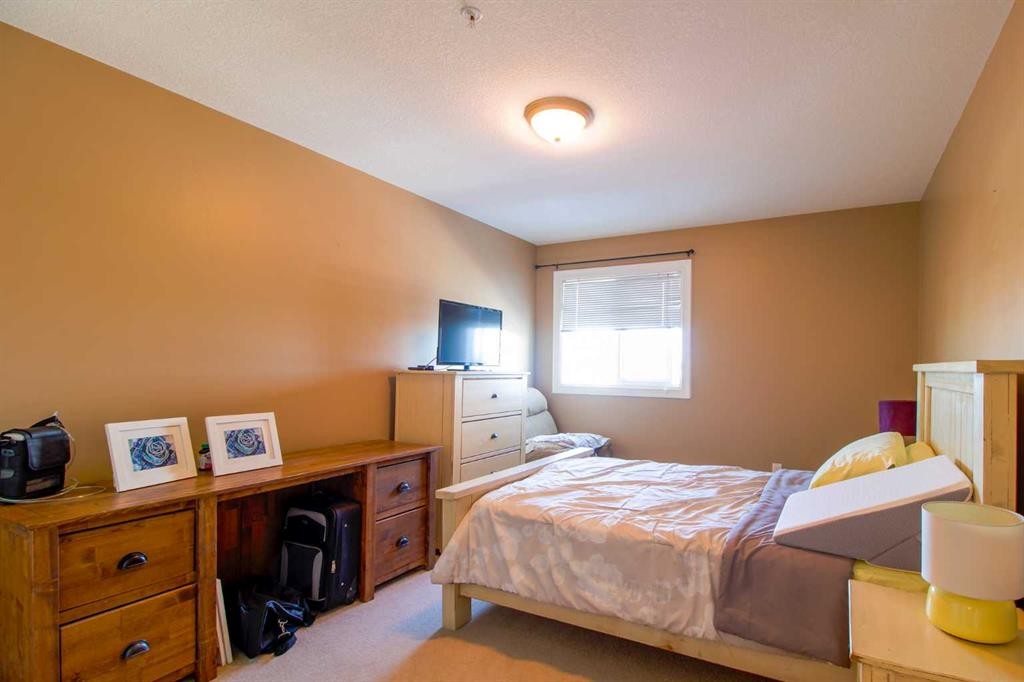 310B-5101 18 Street, Lloydminster, AB - Indoor Photo Showing Bedroom