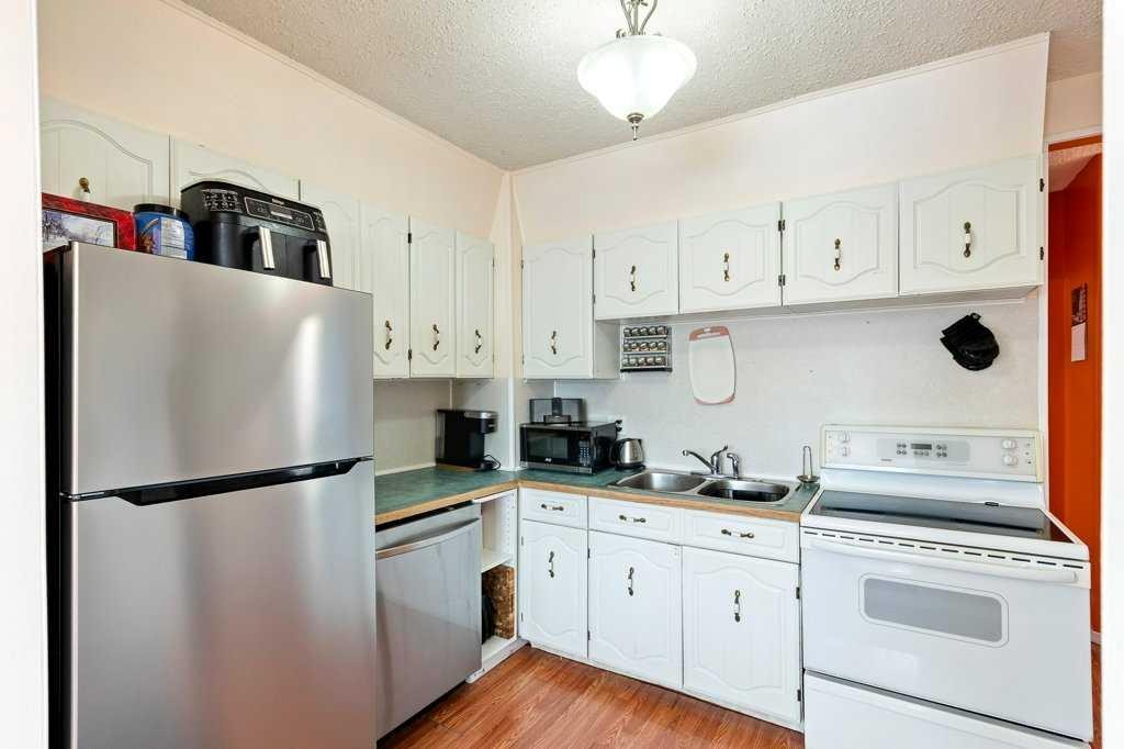 5412 50 Street West, Lloydminster, AB - Indoor Photo Showing Kitchen With Double Sink