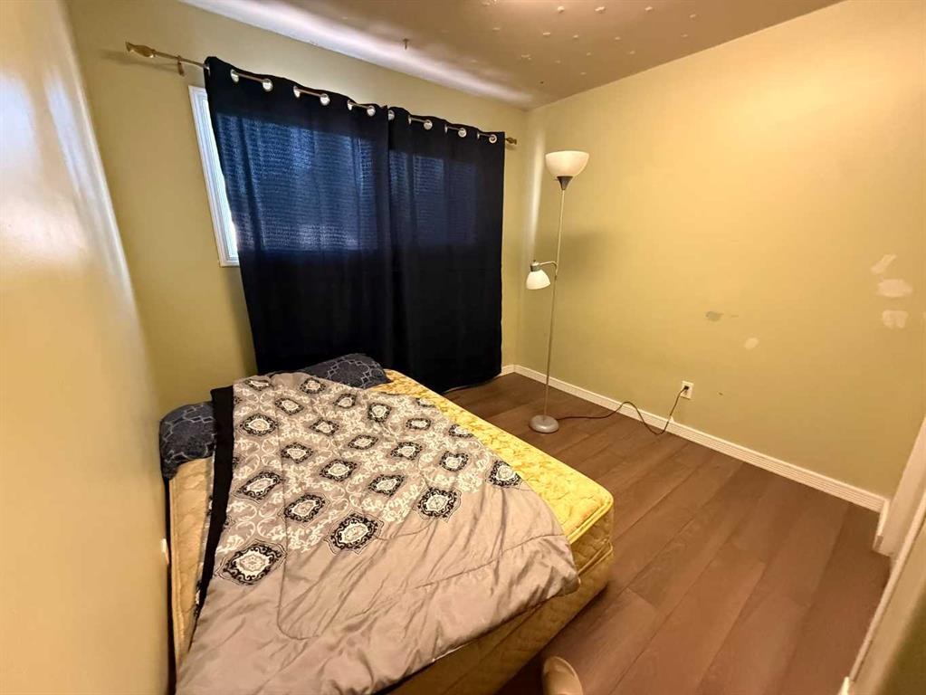 1126 6 Avenue, Wainwright, AB - Indoor Photo Showing Bedroom