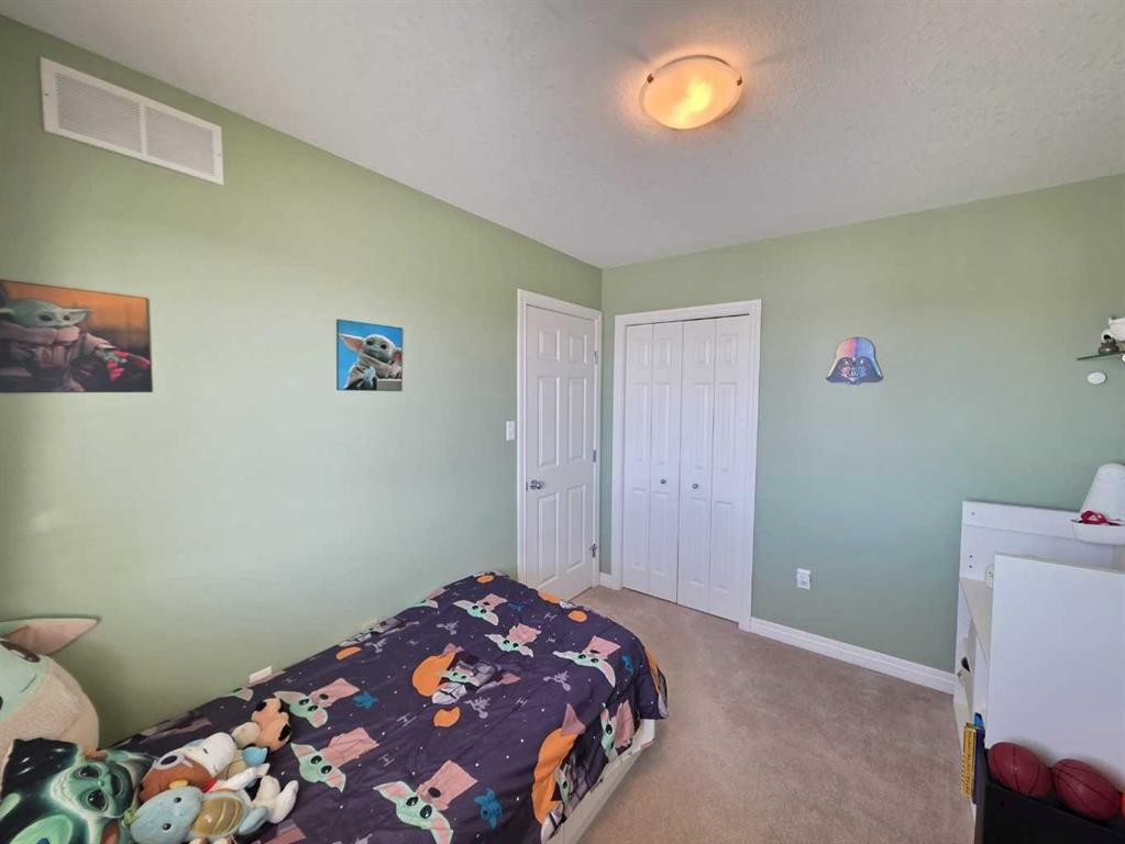 1-2602 11 Avenue, Wainwright, AB - Indoor Photo Showing Bedroom