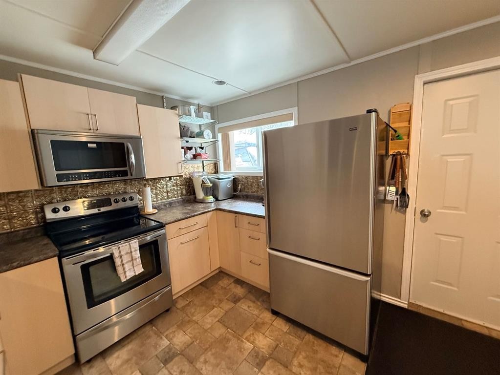 1313 Kewatin, Turtle Lake, SK - Indoor Photo Showing Kitchen With Stainless Steel Kitchen