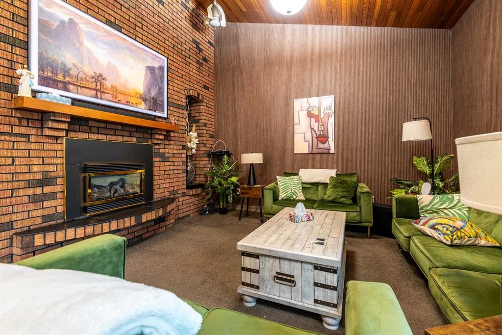 3003 51B Avenue, Lloydminster, AB - Indoor Photo Showing Living Room With Fireplace