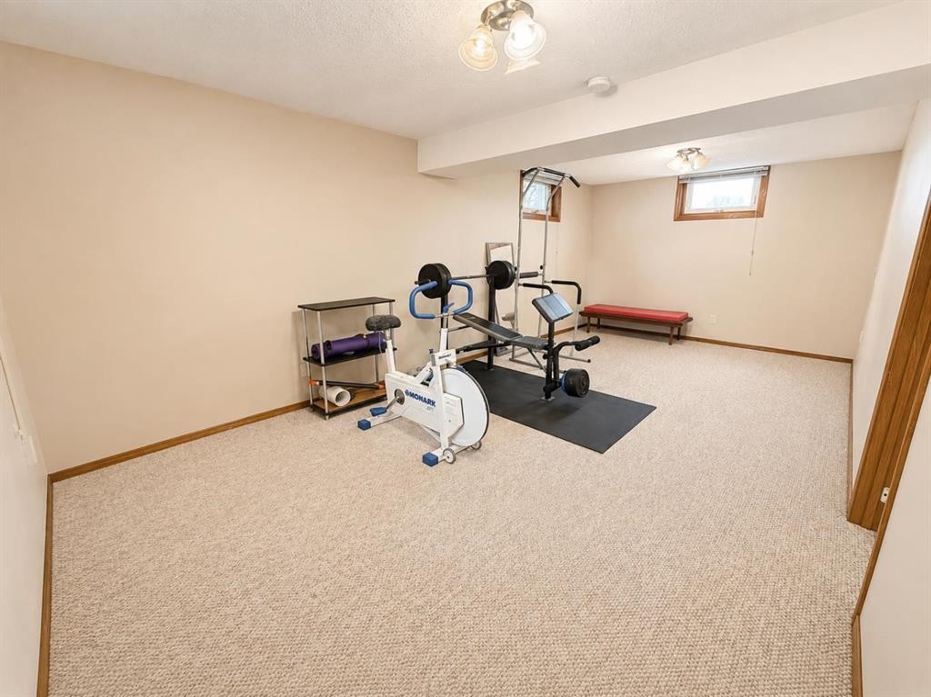 614 6 Avenue, Wainwright, AB - Indoor Photo Showing Gym Room