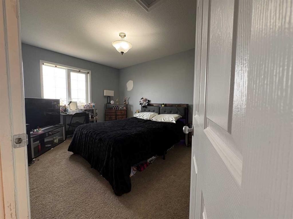 1705 52 Avenue, Lloydminster, AB - Indoor Photo Showing Bedroom