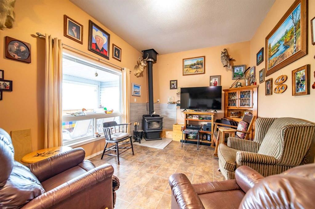 4608 51 Avenue, Czar, AB - Indoor Photo Showing Living Room With Fireplace