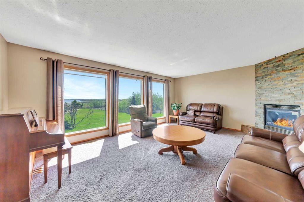 Rr 20 493063, Rural, AB - Indoor Photo Showing Living Room With Fireplace