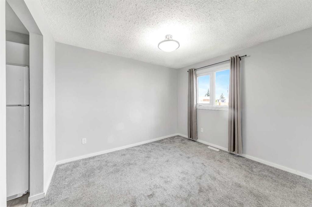 8-5219 57 Street, Lloydminster, AB - Indoor Photo Showing Other Room