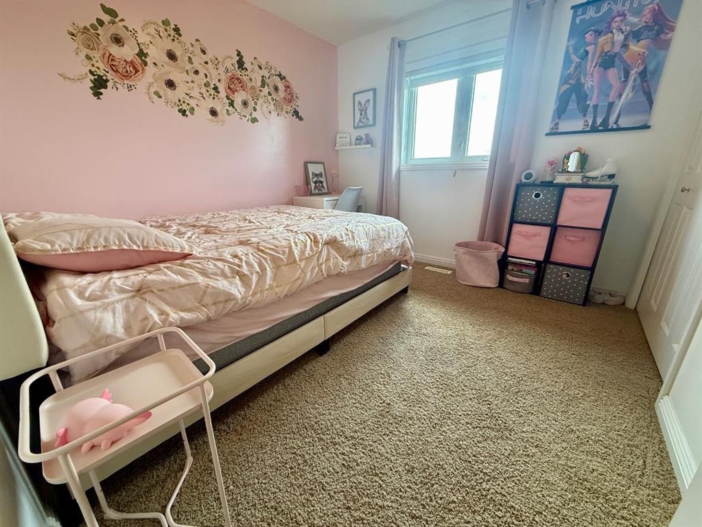 4905 5 Avenue, Chauvin, AB - Indoor Photo Showing Bedroom
