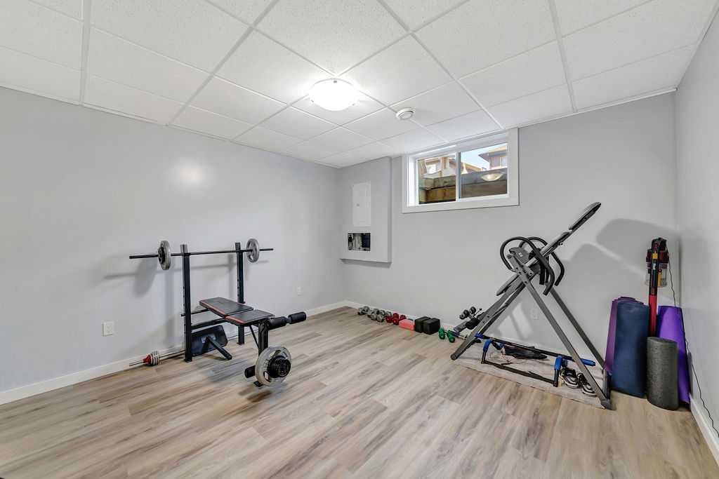 4206 40Th Street Close, Lloydminster, SK - Indoor Photo Showing Gym Room