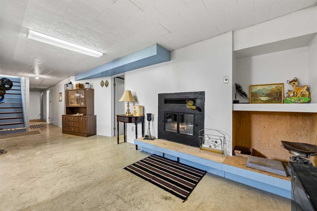 32037 Twp 504, Kitscoty, AB - Indoor With Fireplace