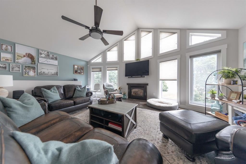 4 Sandpiper Estates, Sandy Beach, AB - Indoor Photo Showing Living Room With Fireplace