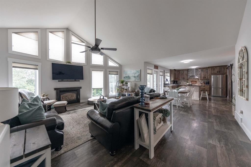 4 Sandpiper Estates, Sandy Beach, AB - Indoor Photo Showing Living Room With Fireplace