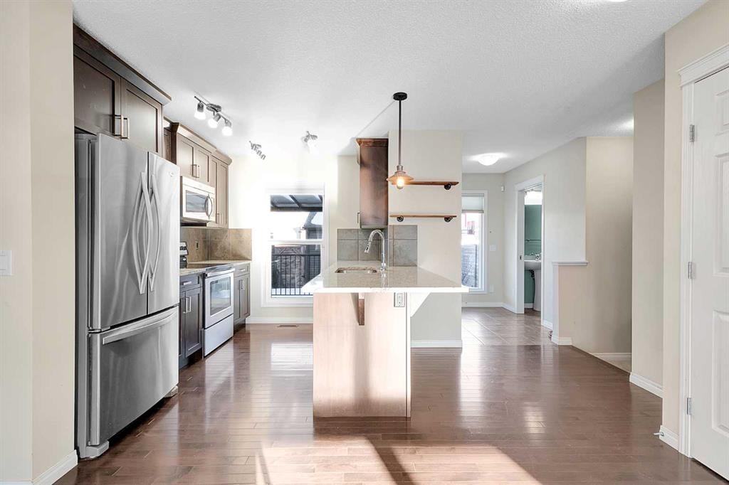 149 Walden Parade Se, Calgary, AB - Indoor Photo Showing Kitchen With Stainless Steel Kitchen