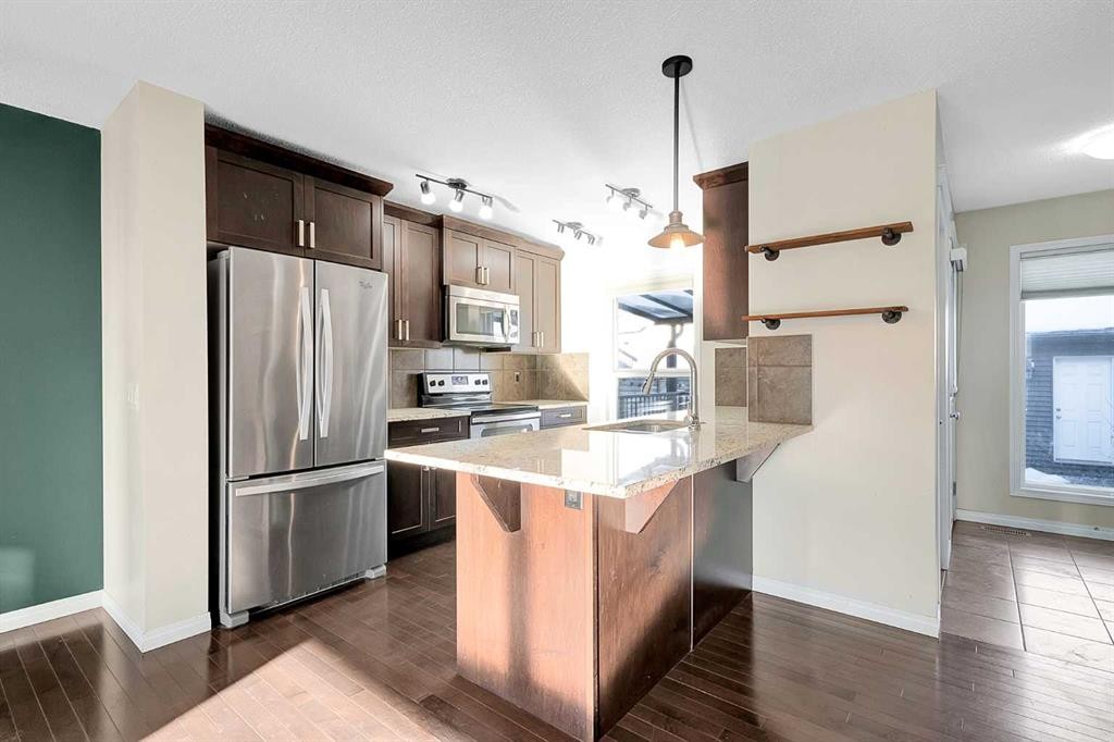 149 Walden Parade Se, Calgary, AB - Indoor Photo Showing Kitchen With Stainless Steel Kitchen