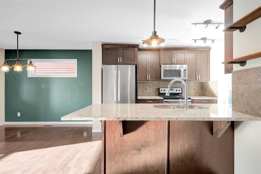 149 Walden Parade Se, Calgary, AB - Indoor Photo Showing Kitchen With Stainless Steel Kitchen With Double Sink With Upgraded Kitchen